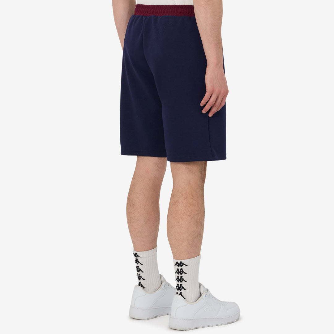 Short Mofio UBB 25/26 Bleu Homme main
