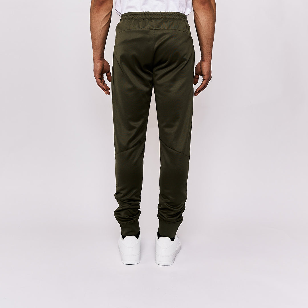Pantalon homme Kouros Sportswear Vert main