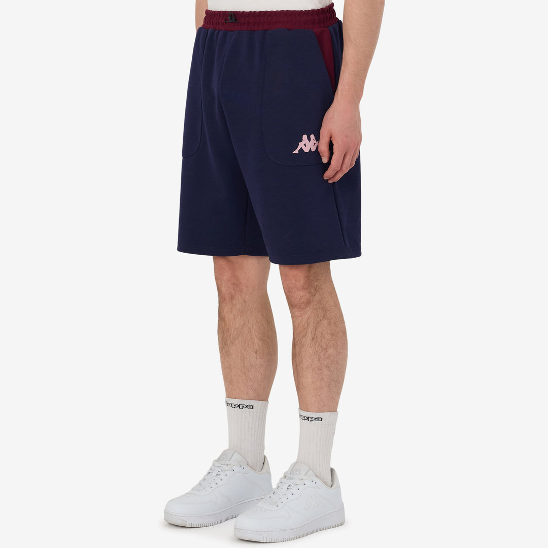Short Mofio UBB 25/26 Bleu Homme main