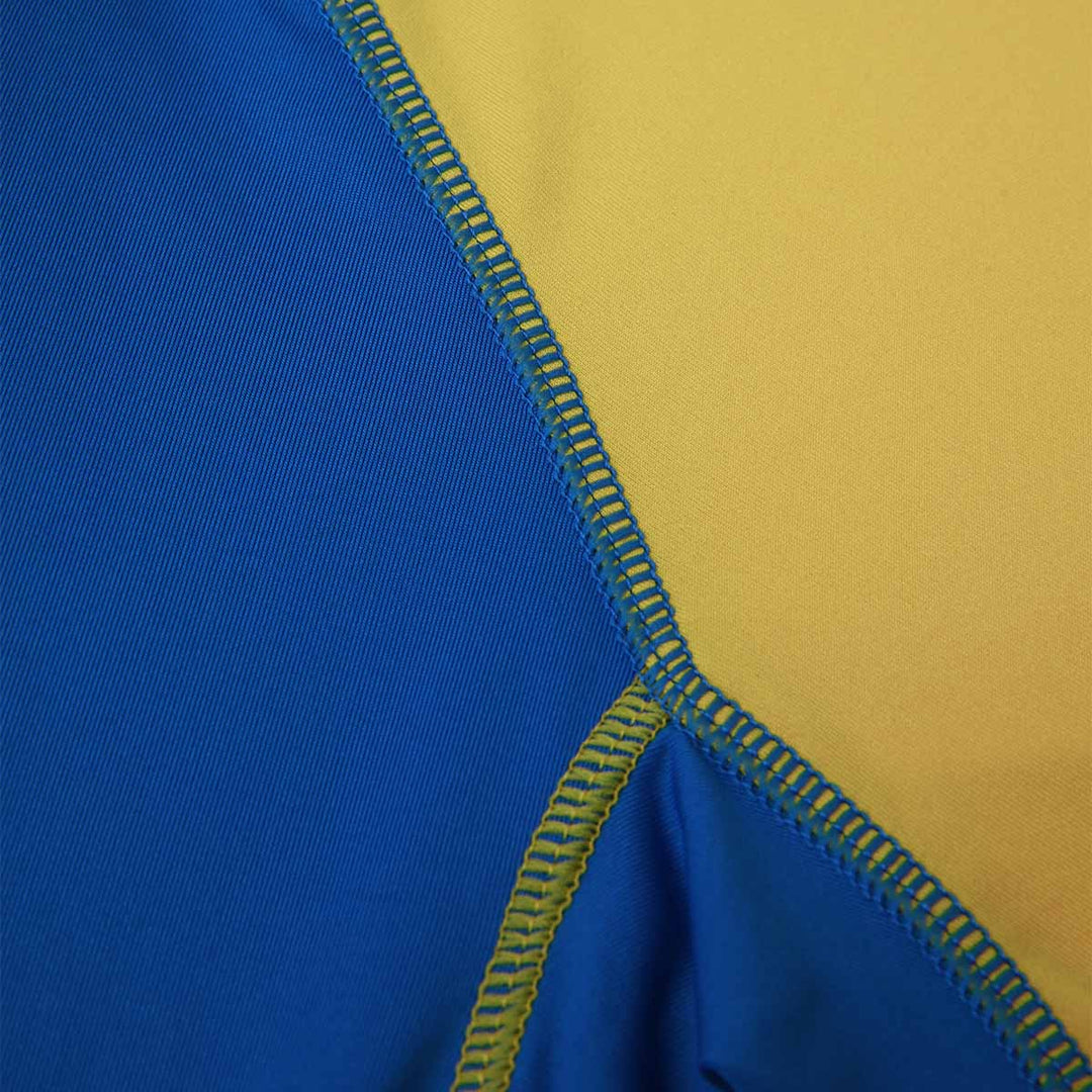 Maillot Kombat XXV Estoril Praia 25/26 Jaune Homme main