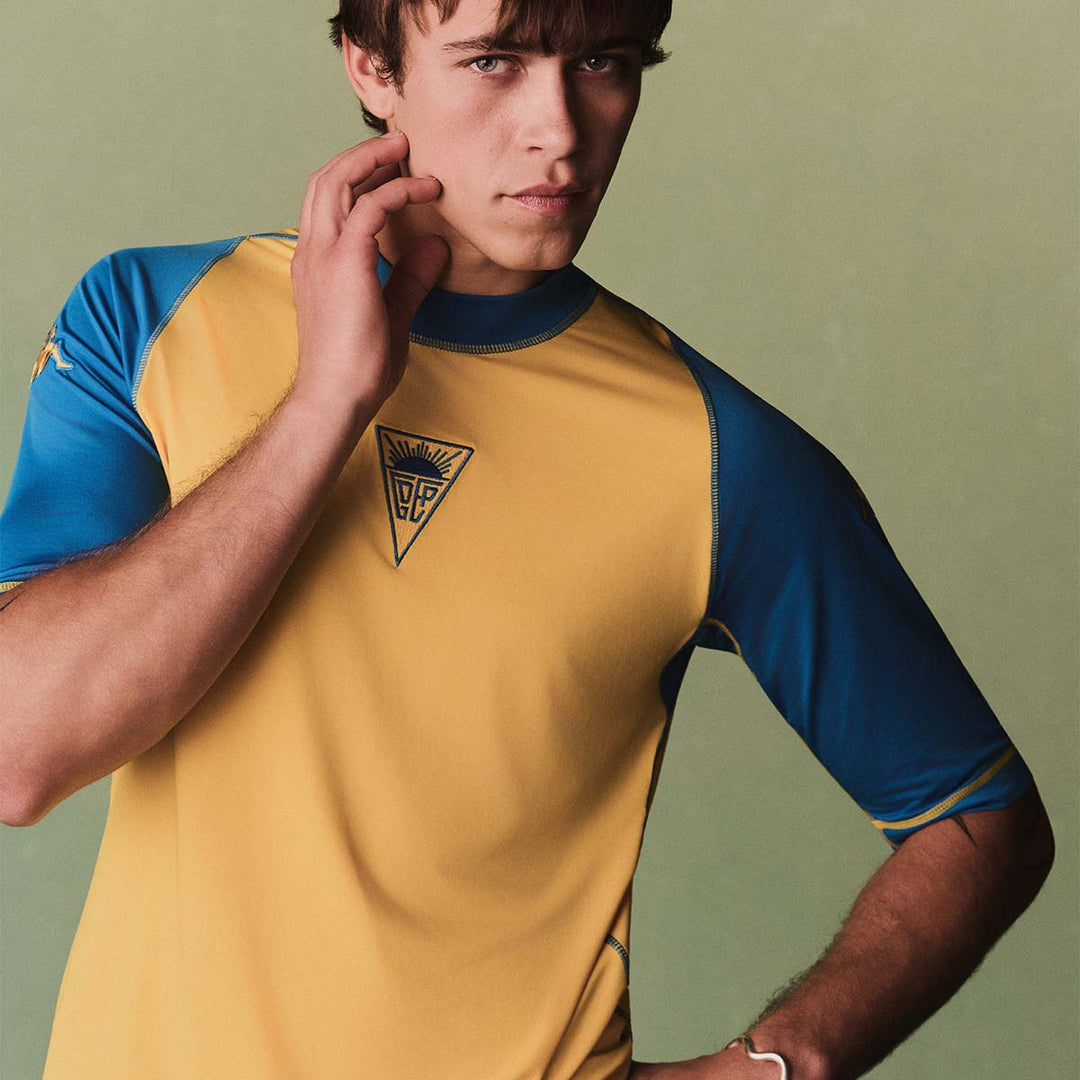 Maillot Kombat XXV Estoril Praia 25/26 Jaune Homme main